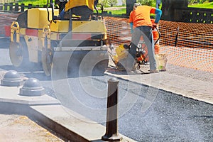 road repairing in urban modern city with heavy vibration roller compactor