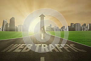 Road rises upward with web traffic text photo