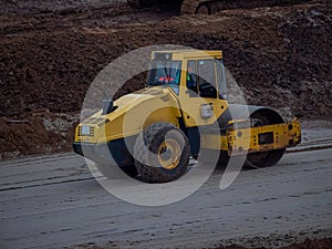 Road roller close up. Roller rolling asphalt on the new road.