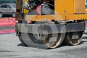 Road roller compaction asphalt concrete pavement photo
