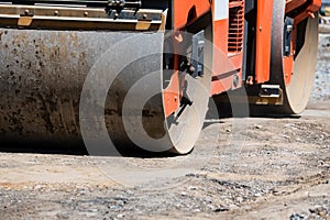 Road roller compactor at asphalt road repairing