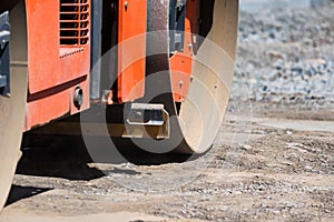 Road roller compactor at asphalt road repairing