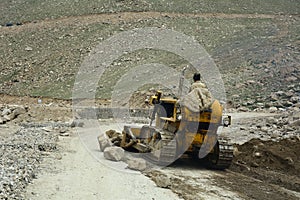 Road roller on the mountain road in northern India