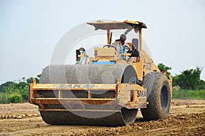 Road roller steamroller or vibratory roller on construction site