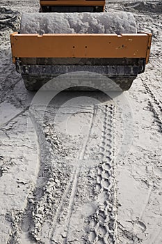 Road roller working on a road