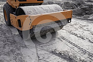 Road roller working on a road