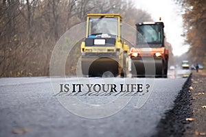 Road rollers during asphalt compaction works