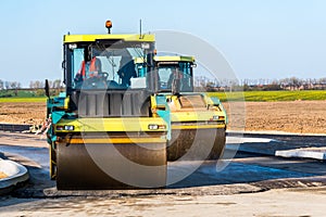 Road rollers working on the construction site