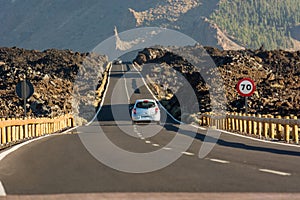 Road running through arid volcanic wasteland On Tenerife.