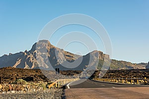 Road running through arid volcanic wasteland On Tenerife.