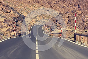 Road running through arid volcanic wasteland On Tenerife.