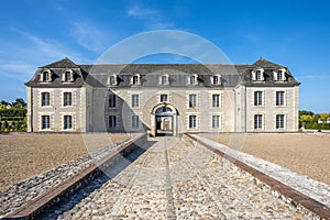 Road running to an old house in a medieval estate in Loire valley, France.