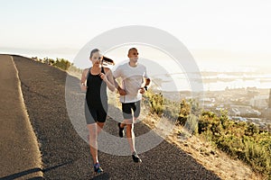 Road, running and woman with man for fitness, workout coach and race for healthy body. Exercise, wellness and girl