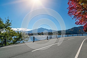 Road Scenery with Lake and Mountain Landscape