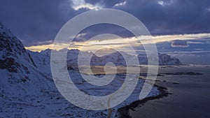 Road, Sea Shore and Mountains in Winter. Lofoten Islands, Norway. Aerial View