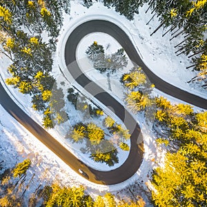 Road serpentine in wintertime from above