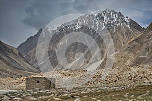 The road between Shimshal village 3100m and Upper Shimshal 5,680m runs through steep gorges on narrow paths and hollowed out i photo