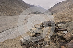 The road between Shimshal village 3100m and Upper Shimshal 5,680m runs through steep gorges on narrow paths and hollowed out i photo