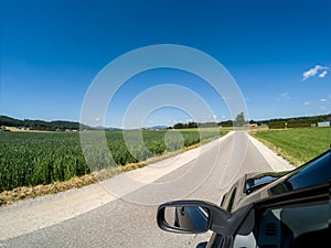 Road and side mirror good sunny weather