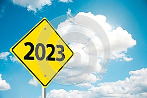 Road sign 2023 on sky