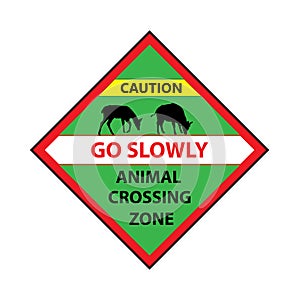 road sign: Animal Crossing Zone. Deer and wild ox. Drive slowly for animal safety.