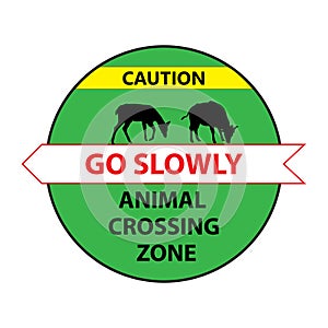 road sign: Animal Crossing Zone. Deer and wild ox. Drive slowly for animal safety.