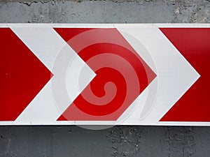 Road sign, arrow, pointer, icon. Metaphor and symbol of movement and development.