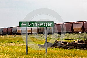 Road Sign an arrow to Drinkwater village photo