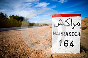 Road sign in the atlas mountains,morocco photo