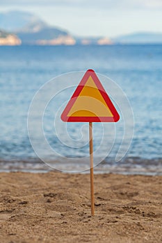 Road sign beach