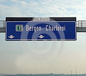 road sign of the Belgian highways near Brussels with the indication city of Bergen