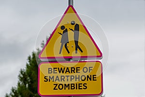 Road sign - beware of smartphone zombies