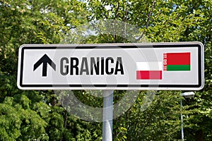 A road sign and border between Poland and Belarus