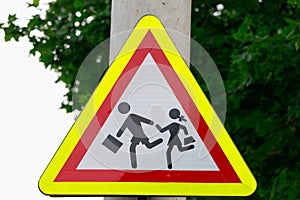 Road sign caution children. Background with copy space