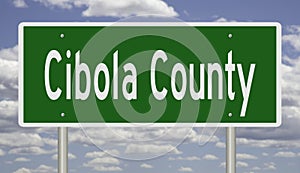 Road sign for Cibola County photo