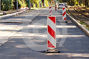 Road sign on city street informing about danger