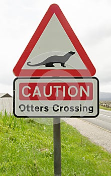 Road sign on a countryside road warning for otters crossing