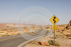 Road Sign for Curves in Desert