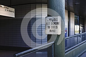 A road sign for cyclists hanged in the carpark