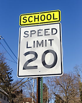 Road sign displaying 20 mph speed limit warning