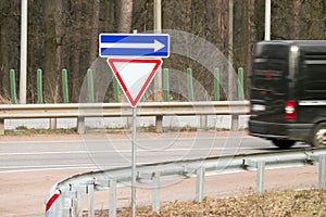 Road sign Giwe Way in the forest.