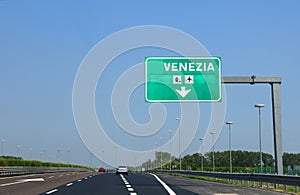 Road sign with indication to go at Venice Island