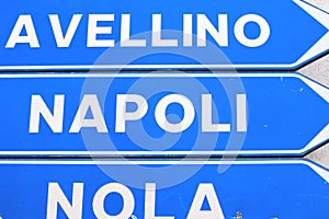 Road sign with the inscription: Avellino, Naples and Nola photo