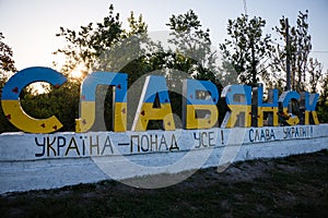 Road sign with an inscription in Ukrainian - Slavyansk