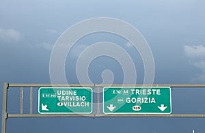 road sign of the Italian motorway with the fork to go to the Aus