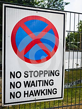 Road sign in Lagos, Nigeria; No stopping, no waiting, no hawking