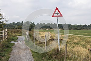 Road sign of low flying aircraft in the nature park at Roode Beek, Schinveld, Netherlands