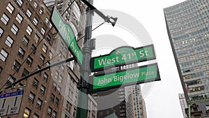 Road Sign in NYC, John Bigelow Plaza and fifth Avenue. Signage for direction West 41st Street