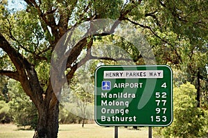 A road sign at Parkes, NSW showing distances to nearby towns