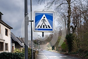 Road sign, pedestrian crossing.